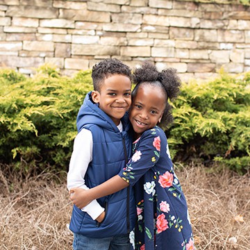 Ayden and Ava portrait, full body, smiling